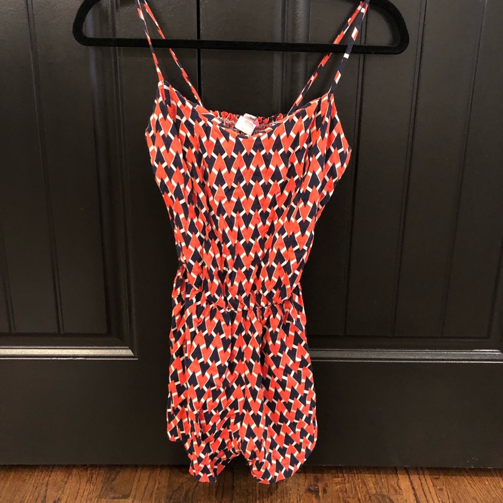 Orange and blue romper. Very cute and flattering!